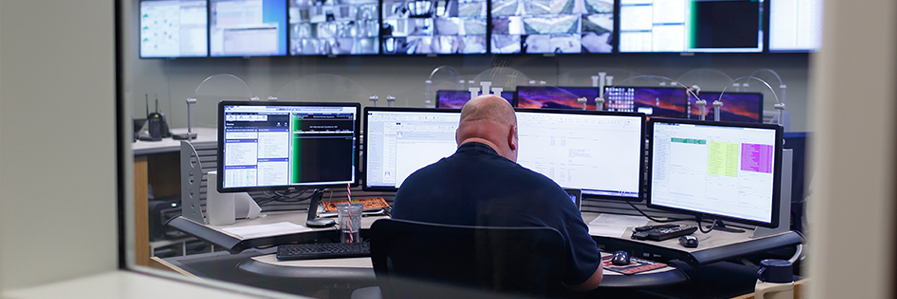 A security engineer works at the network operations monitoring center.